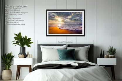 a bedroom with a bed and a picture on the wall