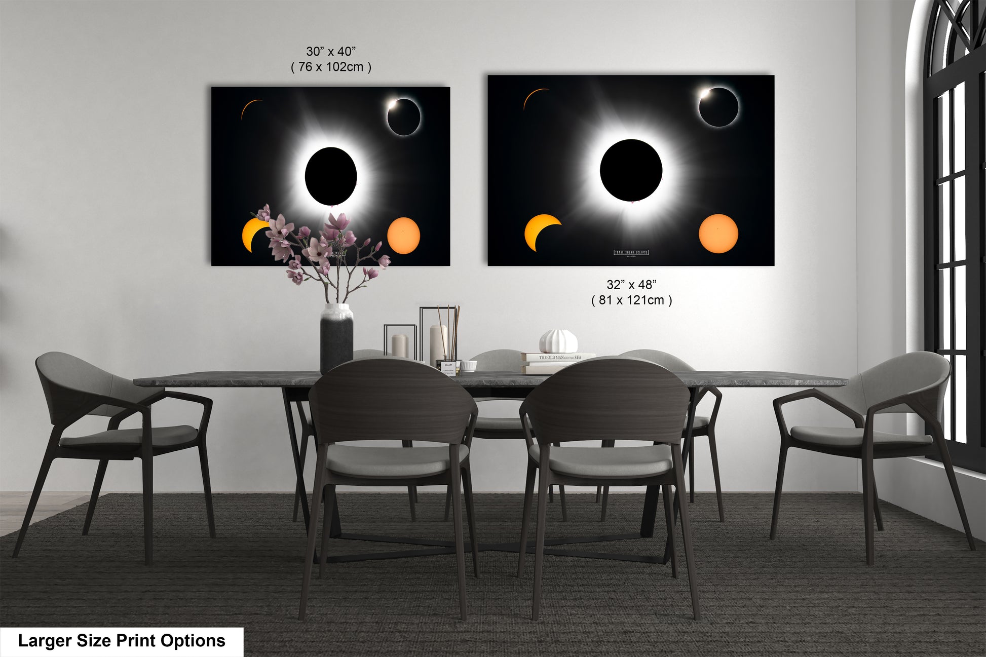 a dining room table with four chairs and a vase with flowers