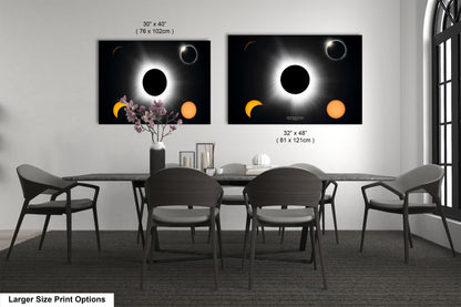 a dining room table with four chairs and a vase with flowers