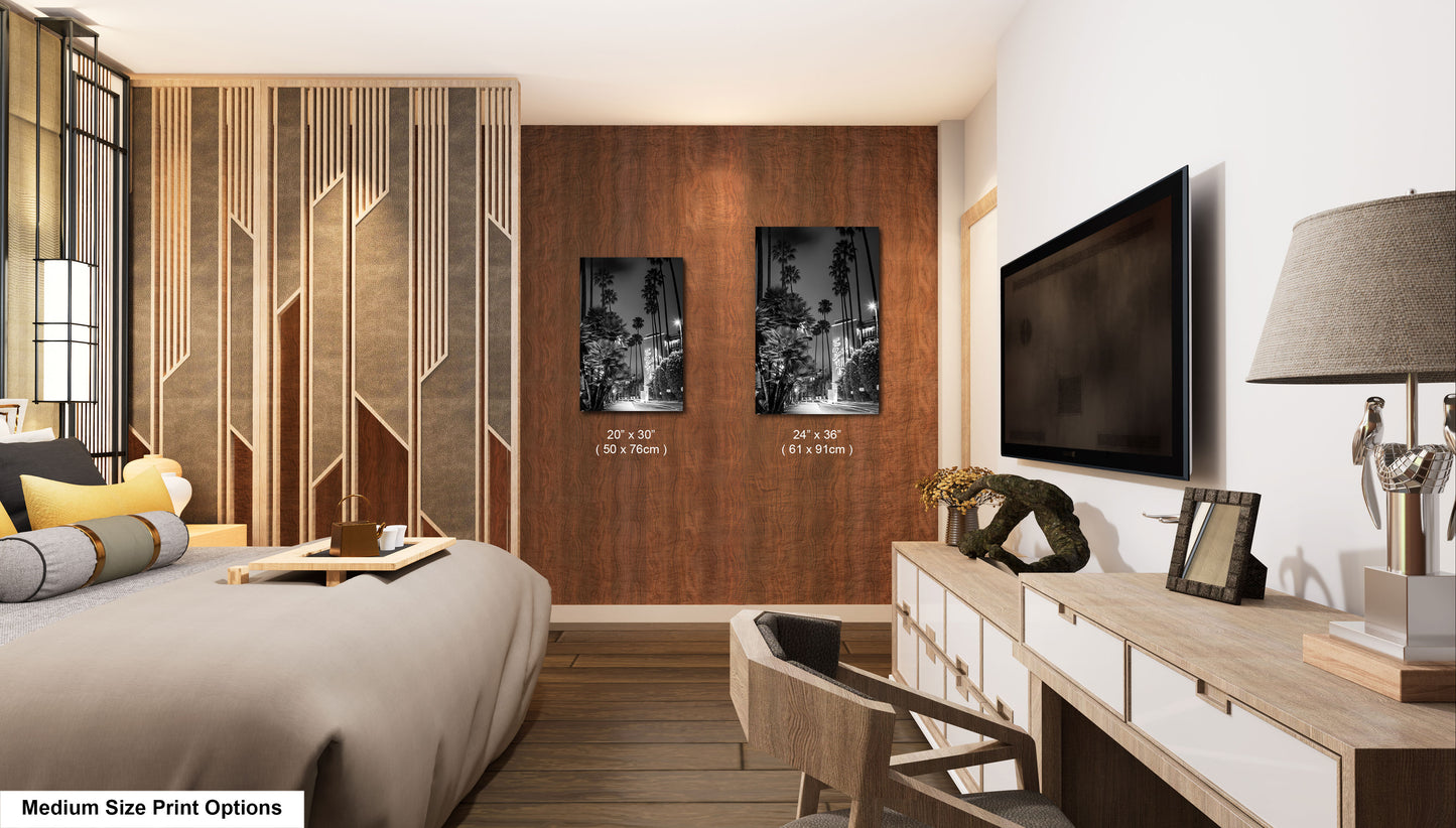a bedroom with a large bed and a flat screen tv