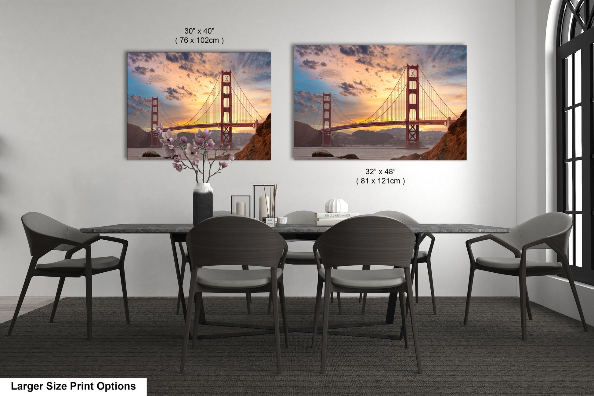 a dining room table with chairs and a picture of the golden gate bridge
