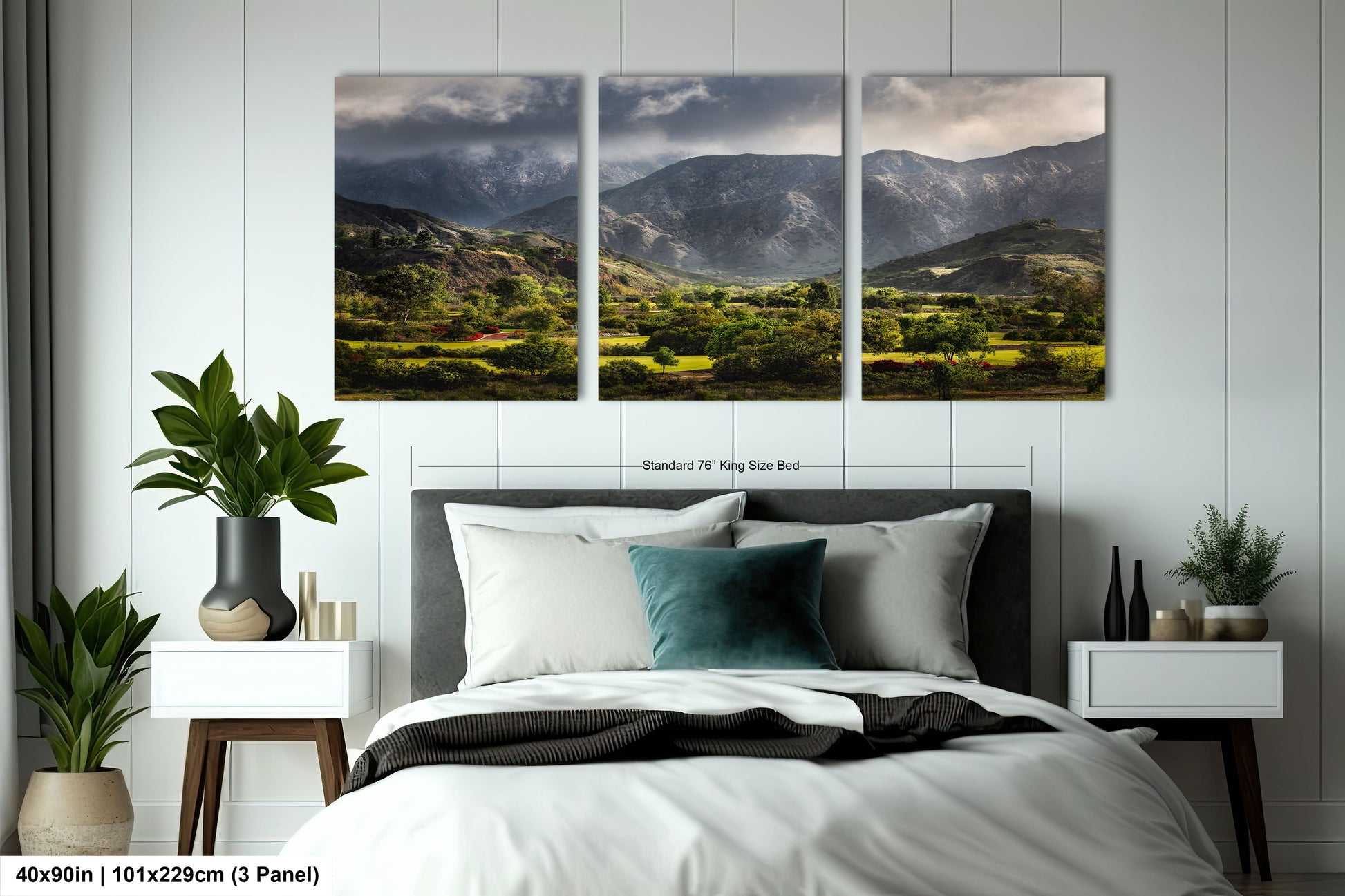 a bed room with a neatly made bed and two pictures on the wall