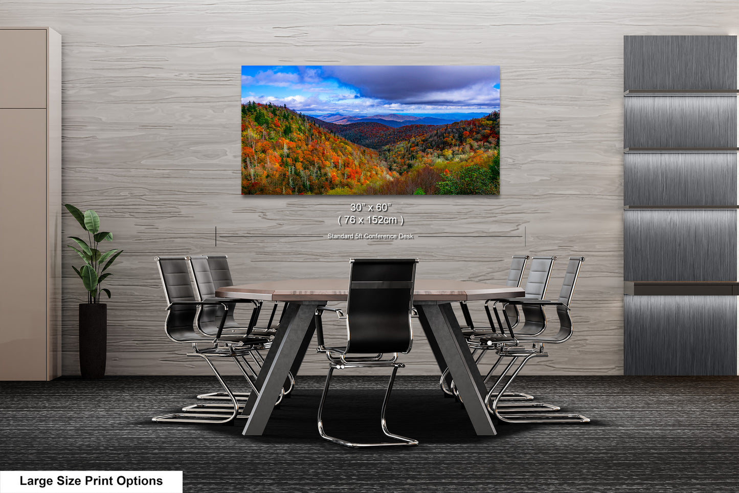 a dining room table with chairs and a painting on the wall