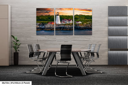 a dining room table with chairs and a painting on the wall