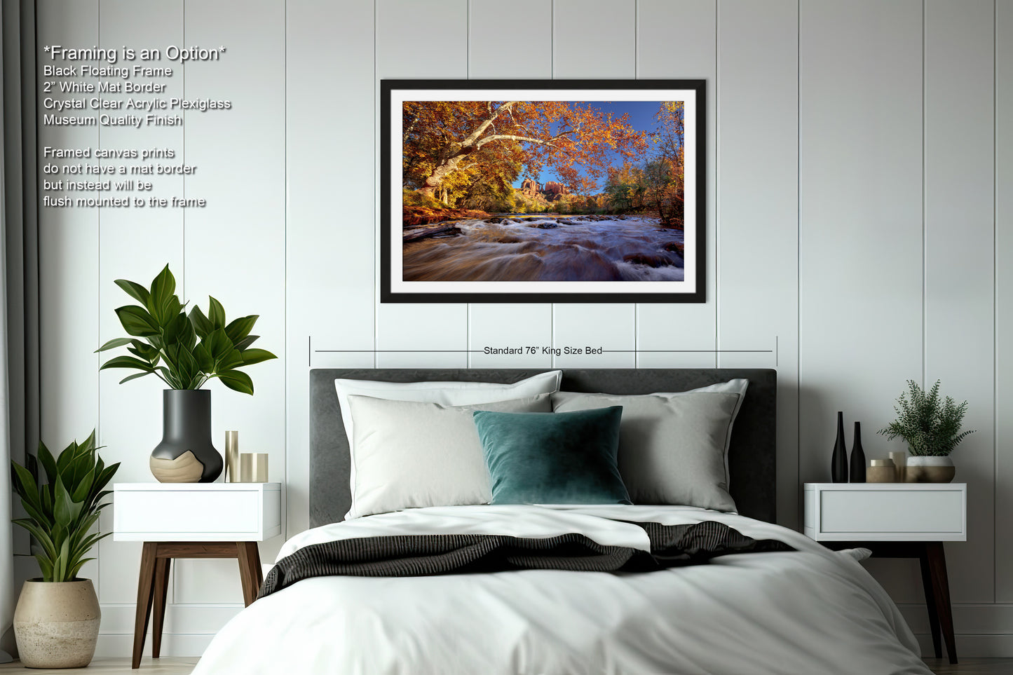 a bedroom with a bed and a picture hanging on the wall