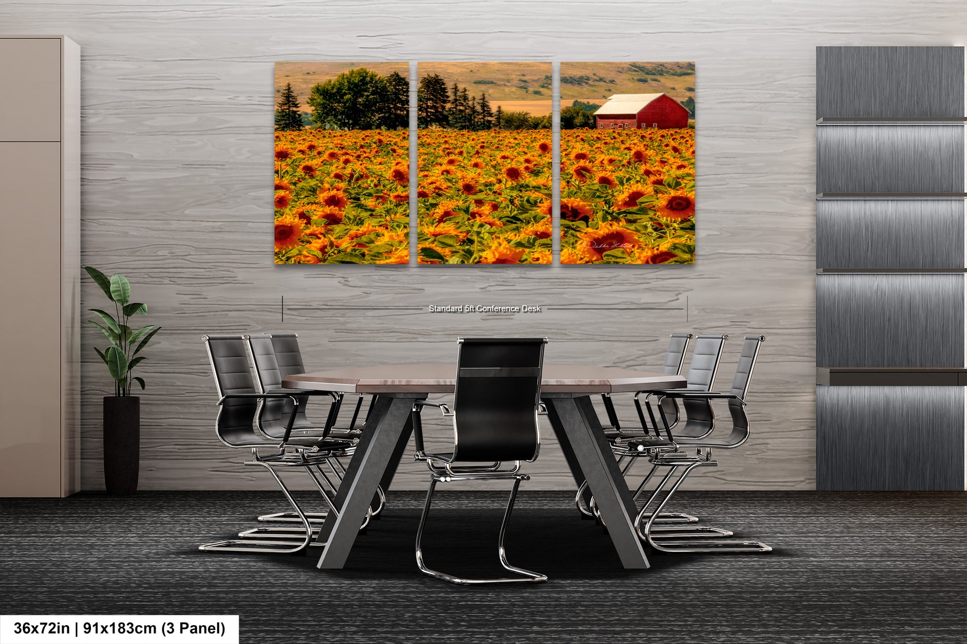 a dining room table with chairs in front of a large sunflower field