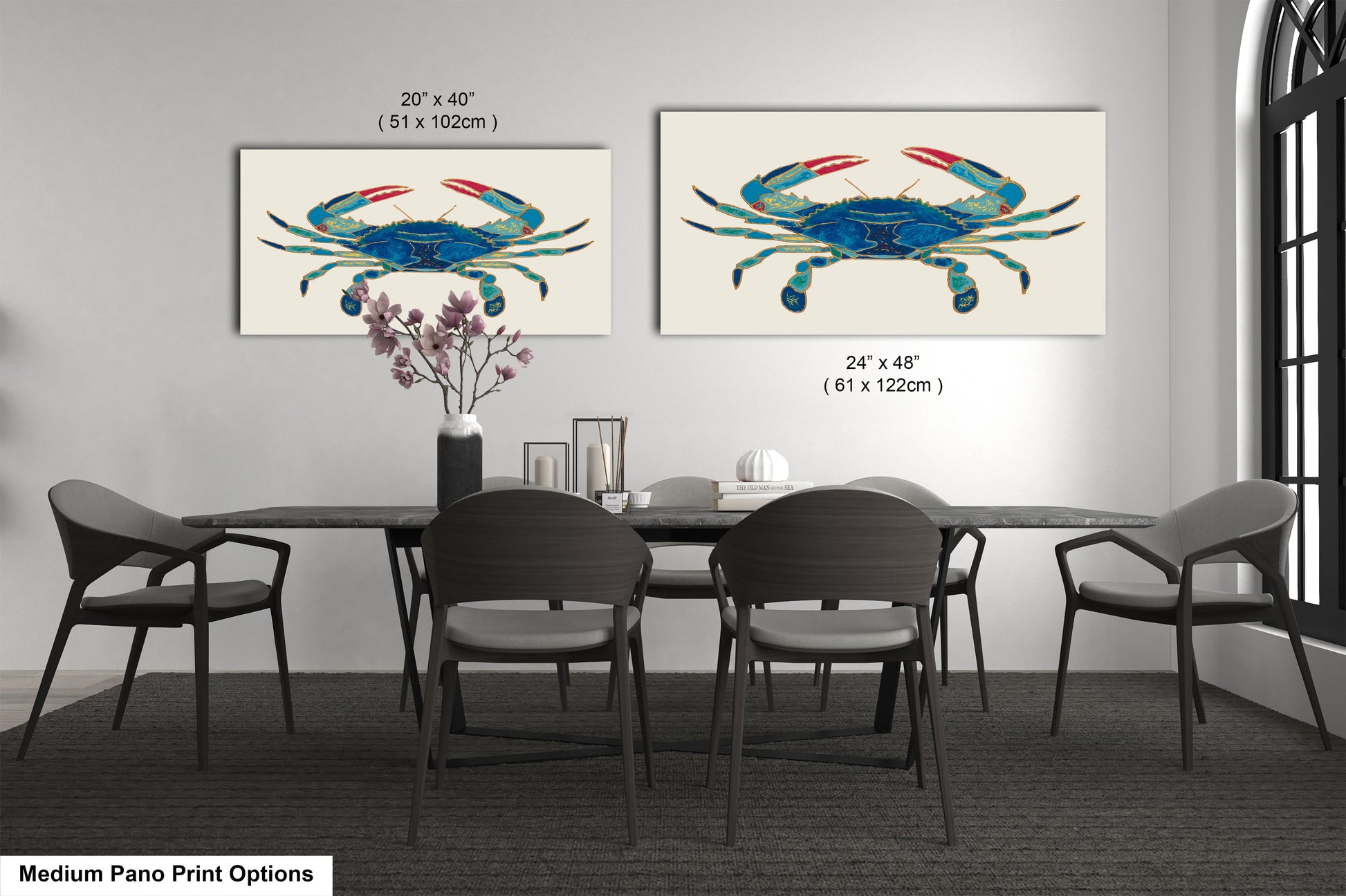 a dining room table with four chairs and two paintings on the wall