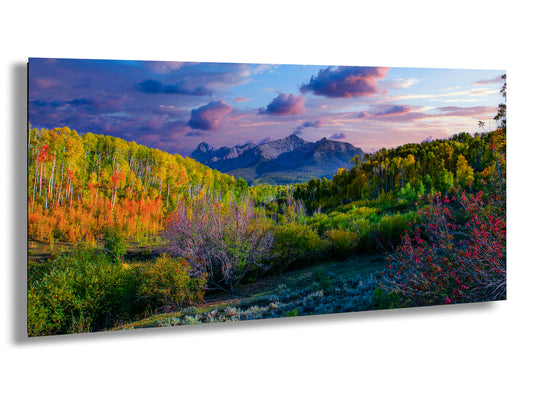 a painting of a mountain scene with colorful trees