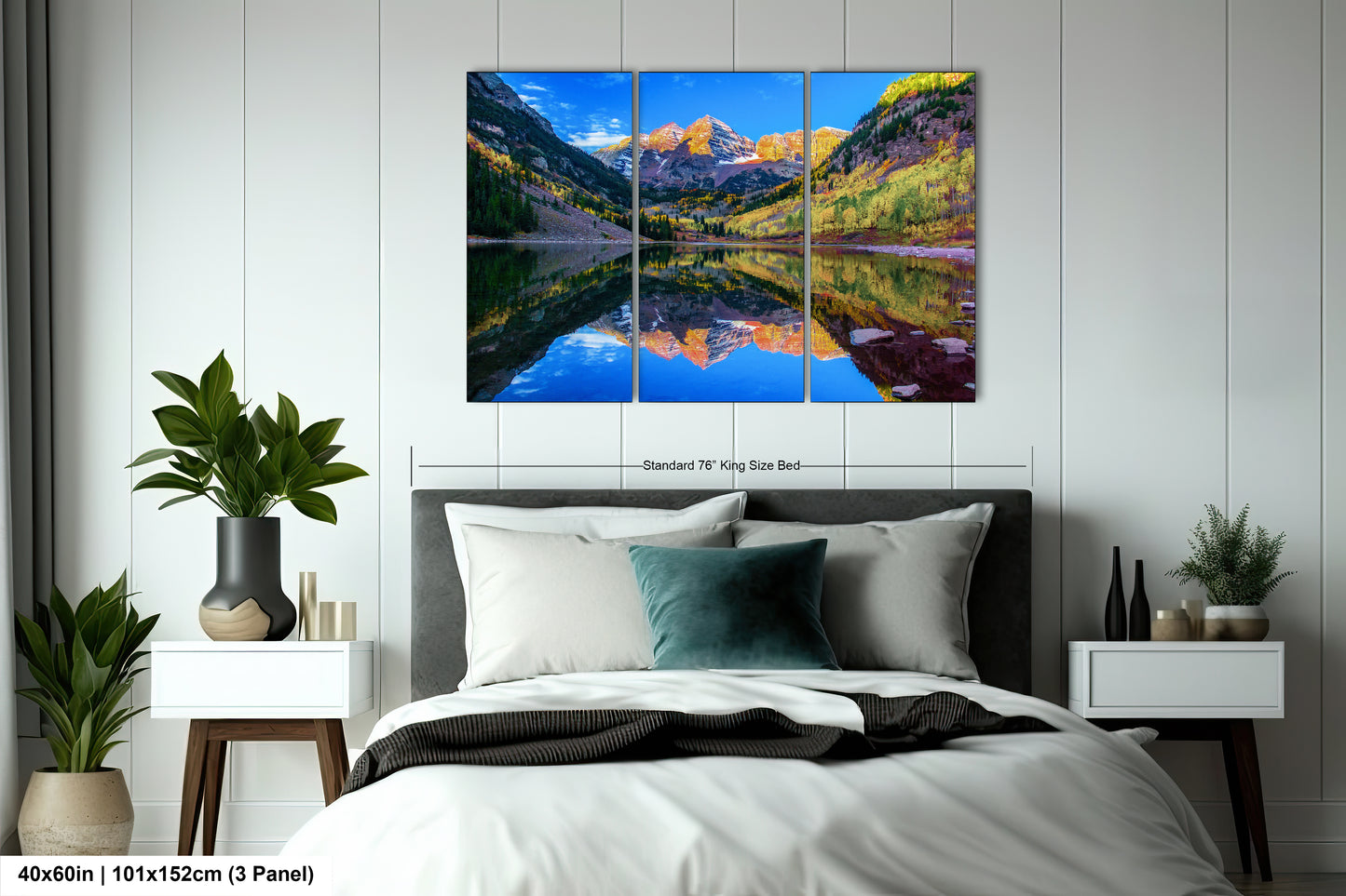 a bedroom with a bed and a painting on the wall