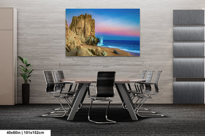 a dining room table with chairs and a painting on the wall