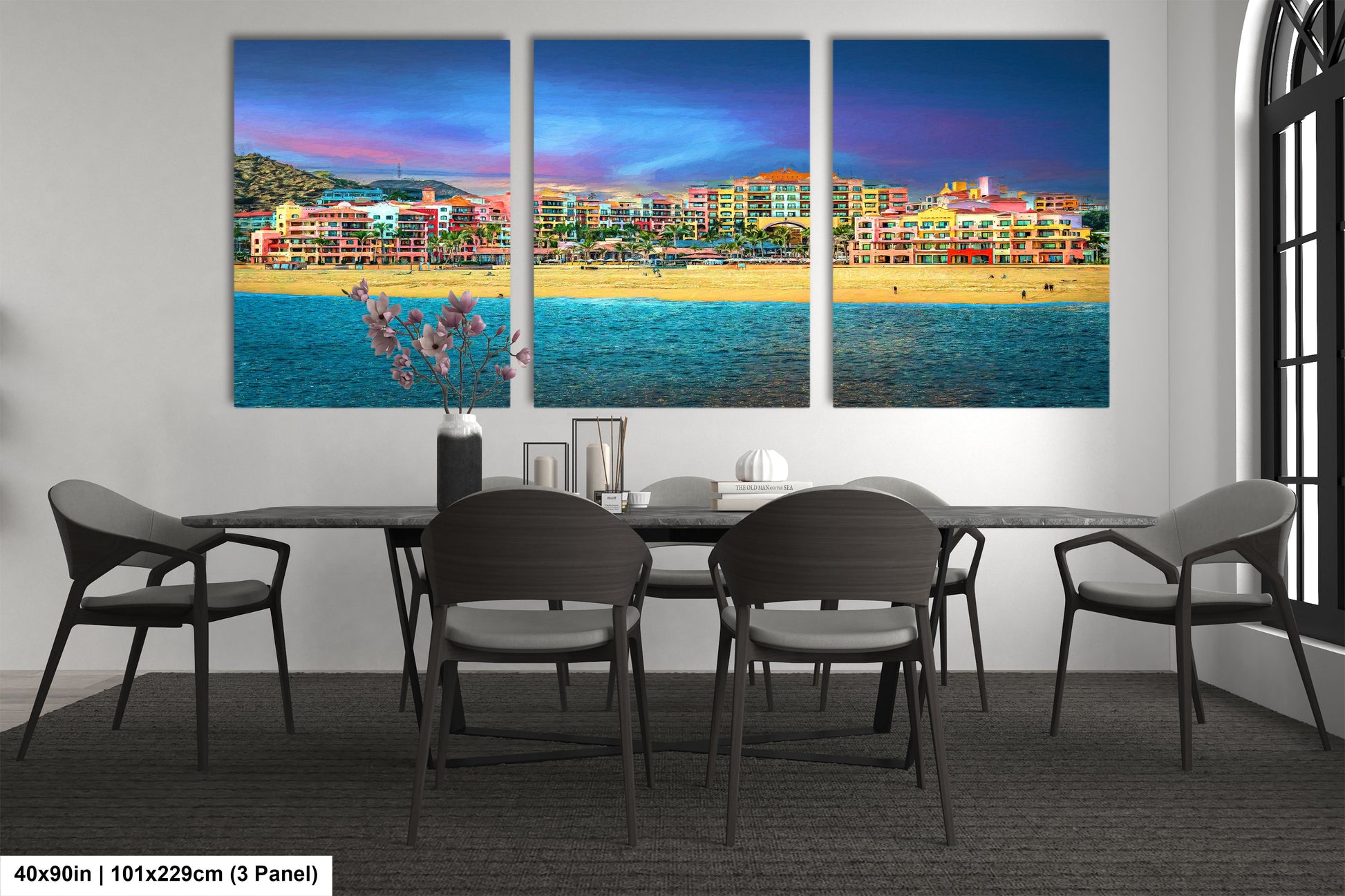 a dining room table with four chairs and a painting on the wall
