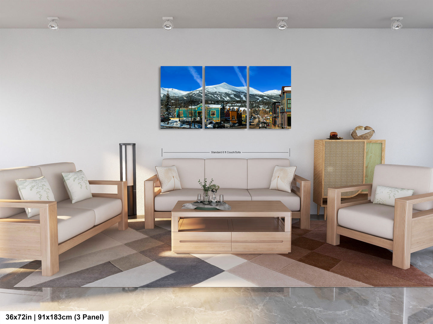 a living room filled with furniture and a painting on the wall