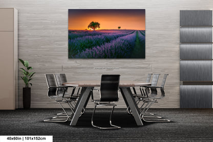 a dining room table with chairs and a painting on the wall