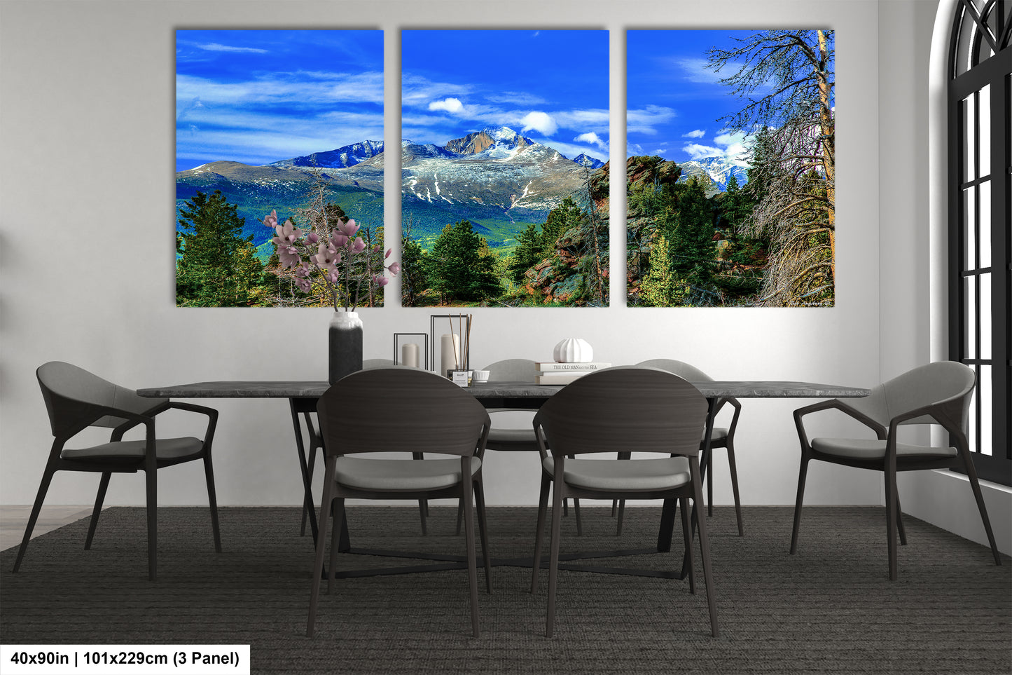 a dining room with a table and four chairs