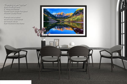 a picture of a dining room with a table and chairs