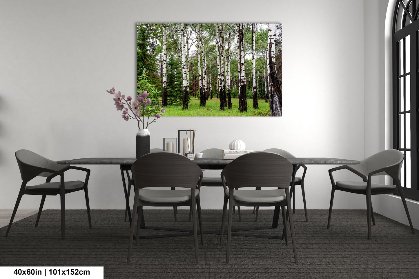 a dining room with a table and chairs