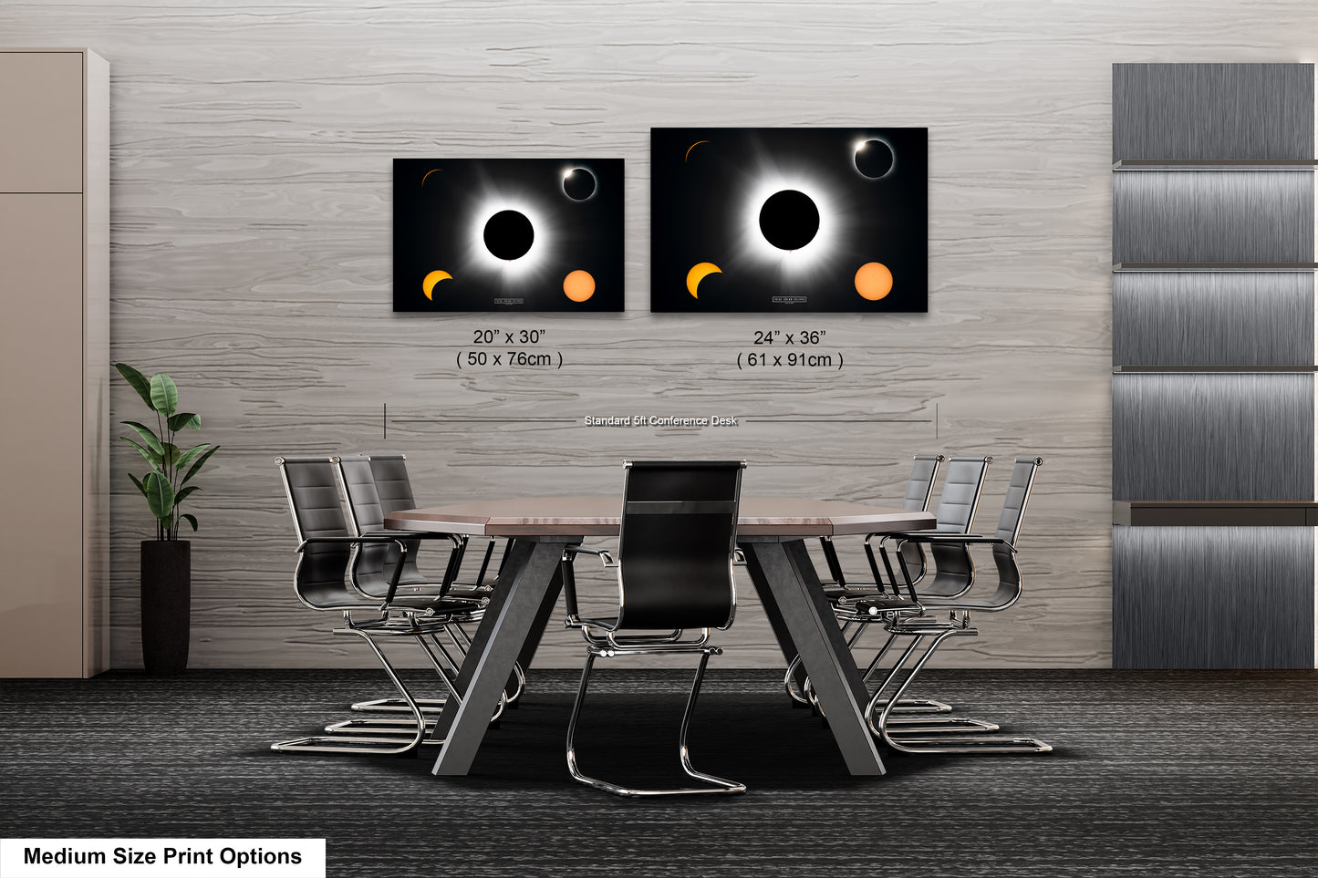 a dining room table with four chairs and two pictures of eclipses on the wall