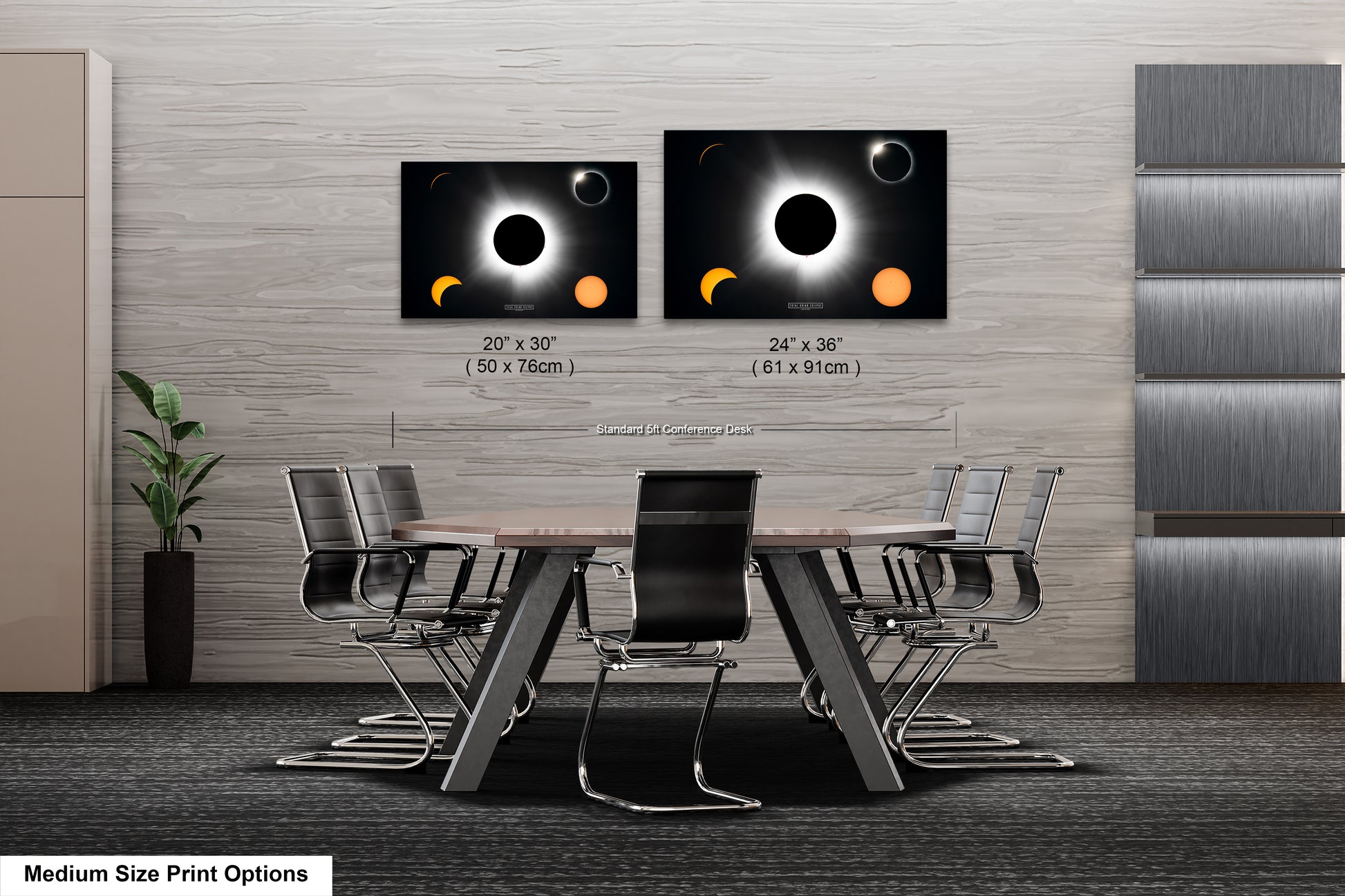 a dining room table with four chairs and two pictures of eclipses on the wall