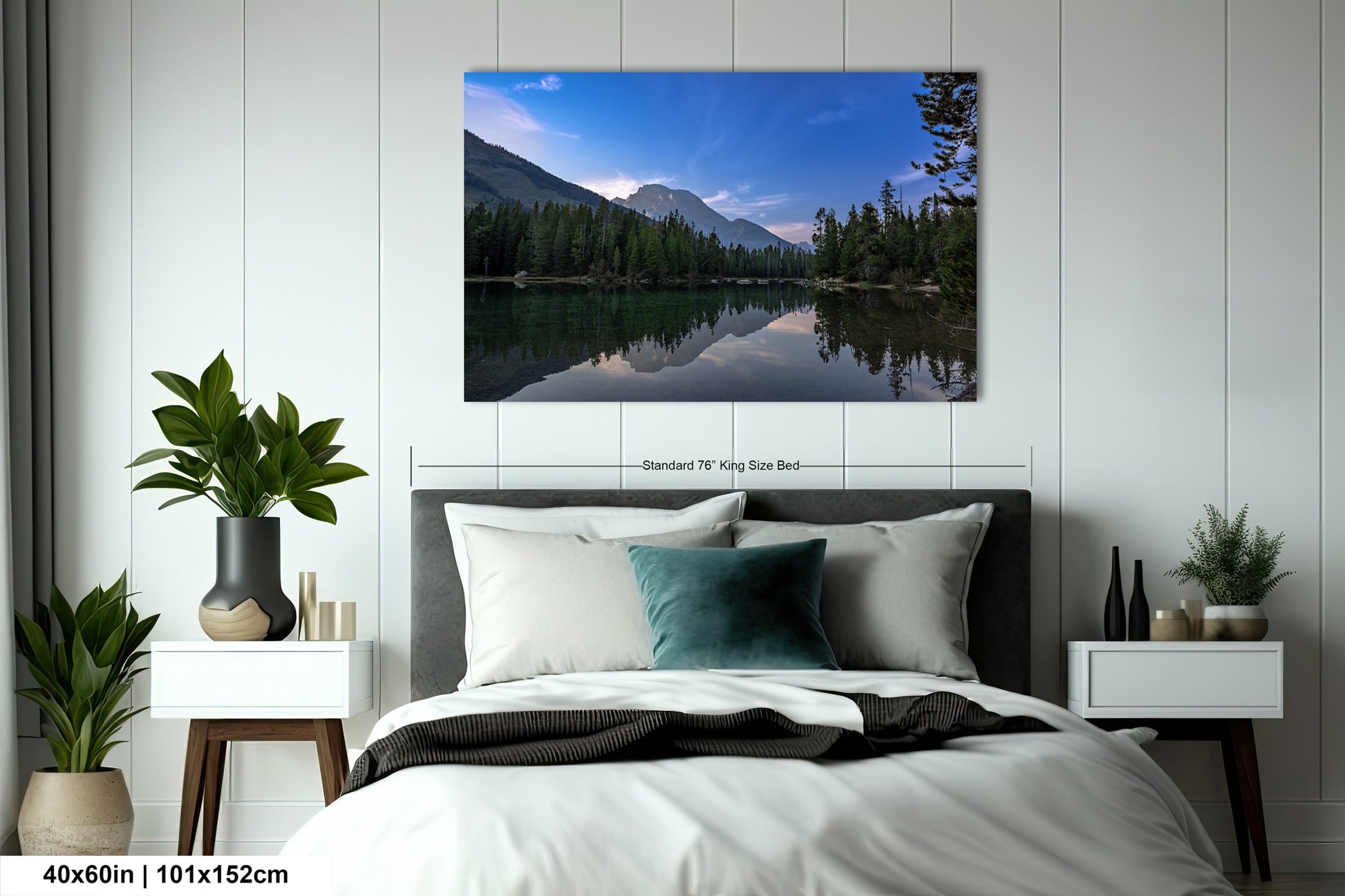 a bedroom with a large bed and a painting on the wall