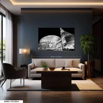 a living room filled with furniture and a painting on the wall