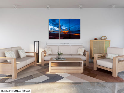 a living room filled with furniture and a painting on the wall
