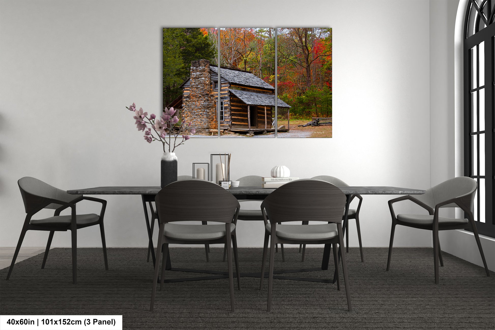 a dining room with a table and chairs