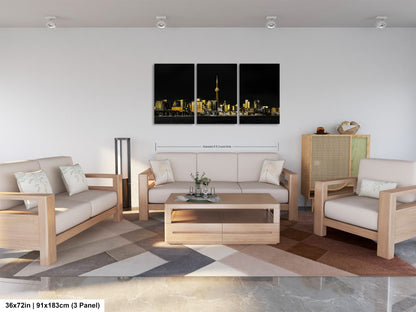 a living room filled with furniture and a painting on the wall