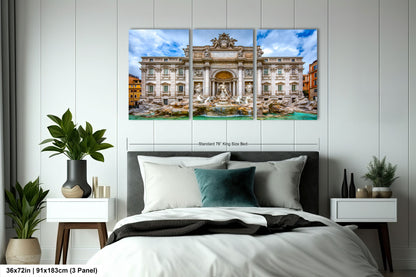 a bedroom with a bed and two paintings on the wall