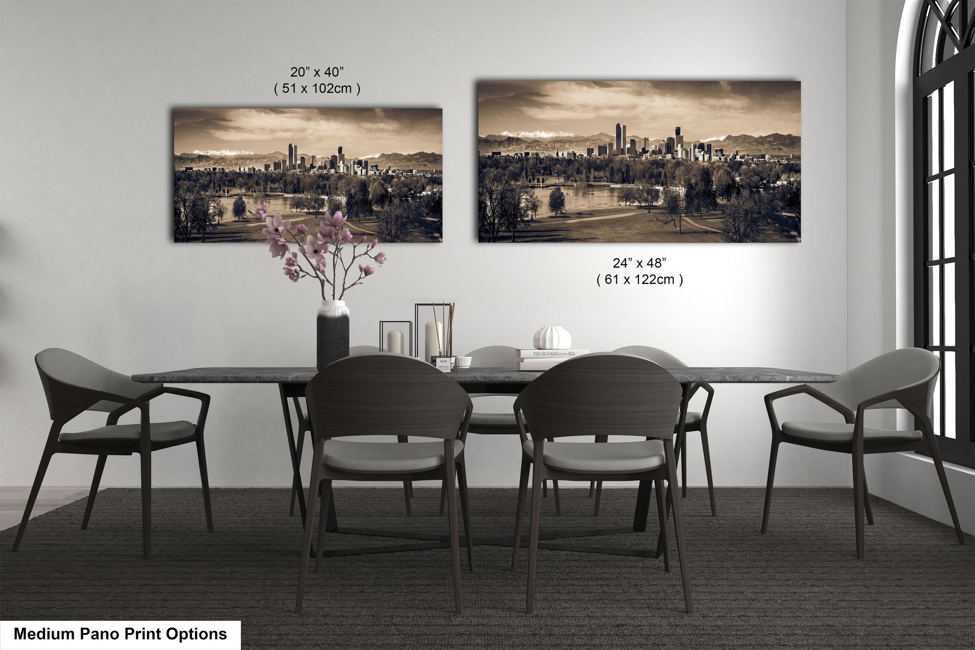 a dining room table with chairs and a vase of flowers