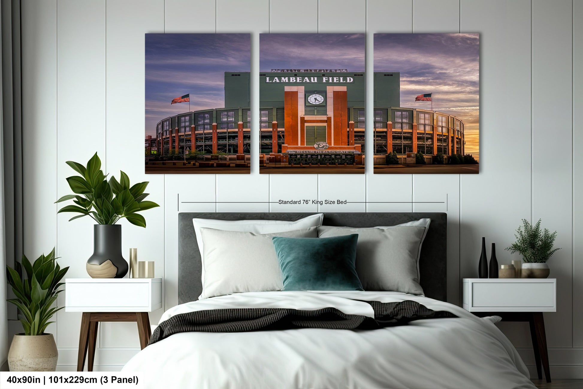 a bed room with a neatly made bed and two pictures on the wall
