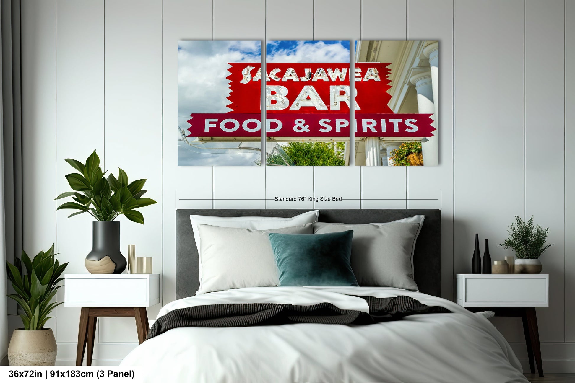 a bedroom with a bed and a sign on the wall