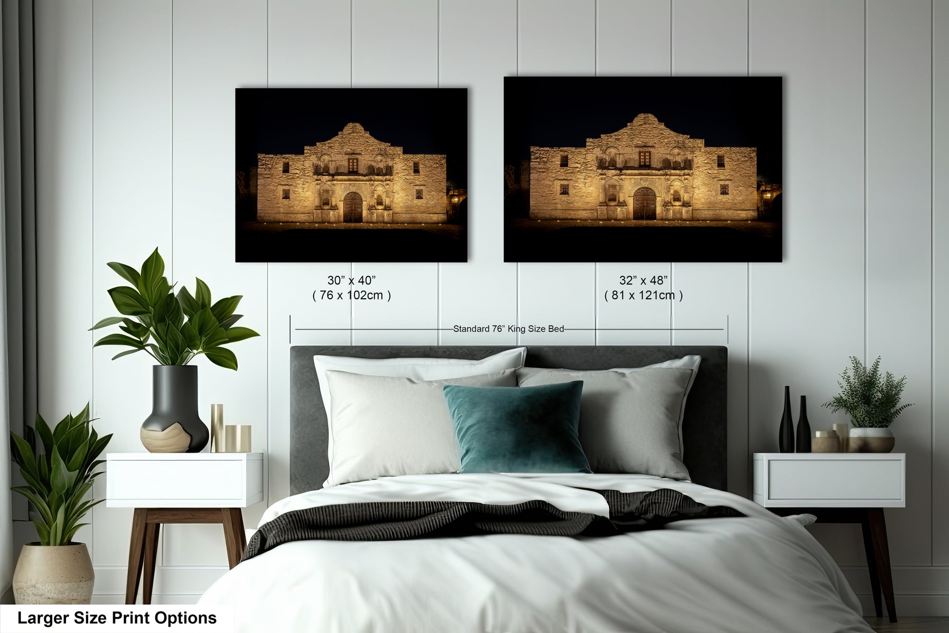 a bedroom with a bed and nightstands, along with two framed prints of a building, likely a historic landmark, displayed on the wall above the bed.