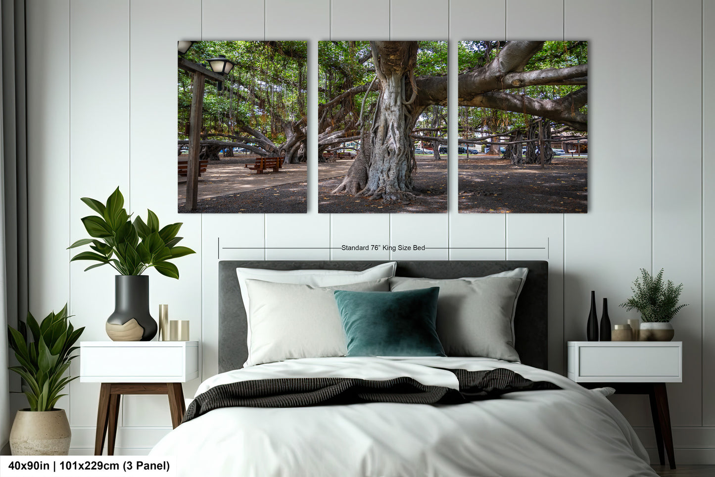 a bed room with a neatly made bed and three pictures on the wall