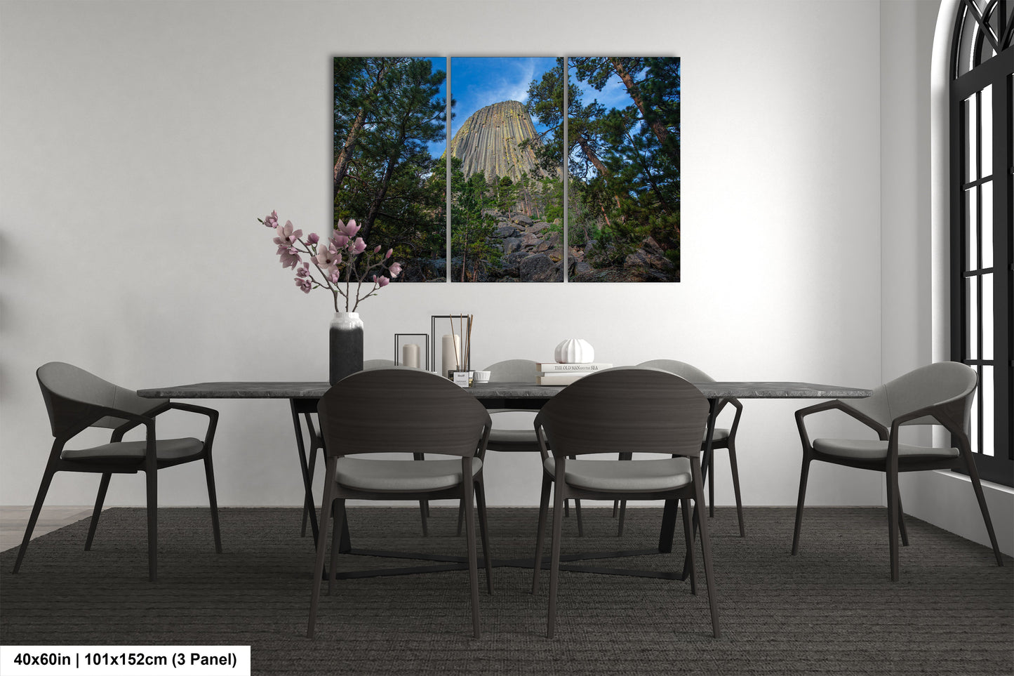 a dining room with a table and chairs