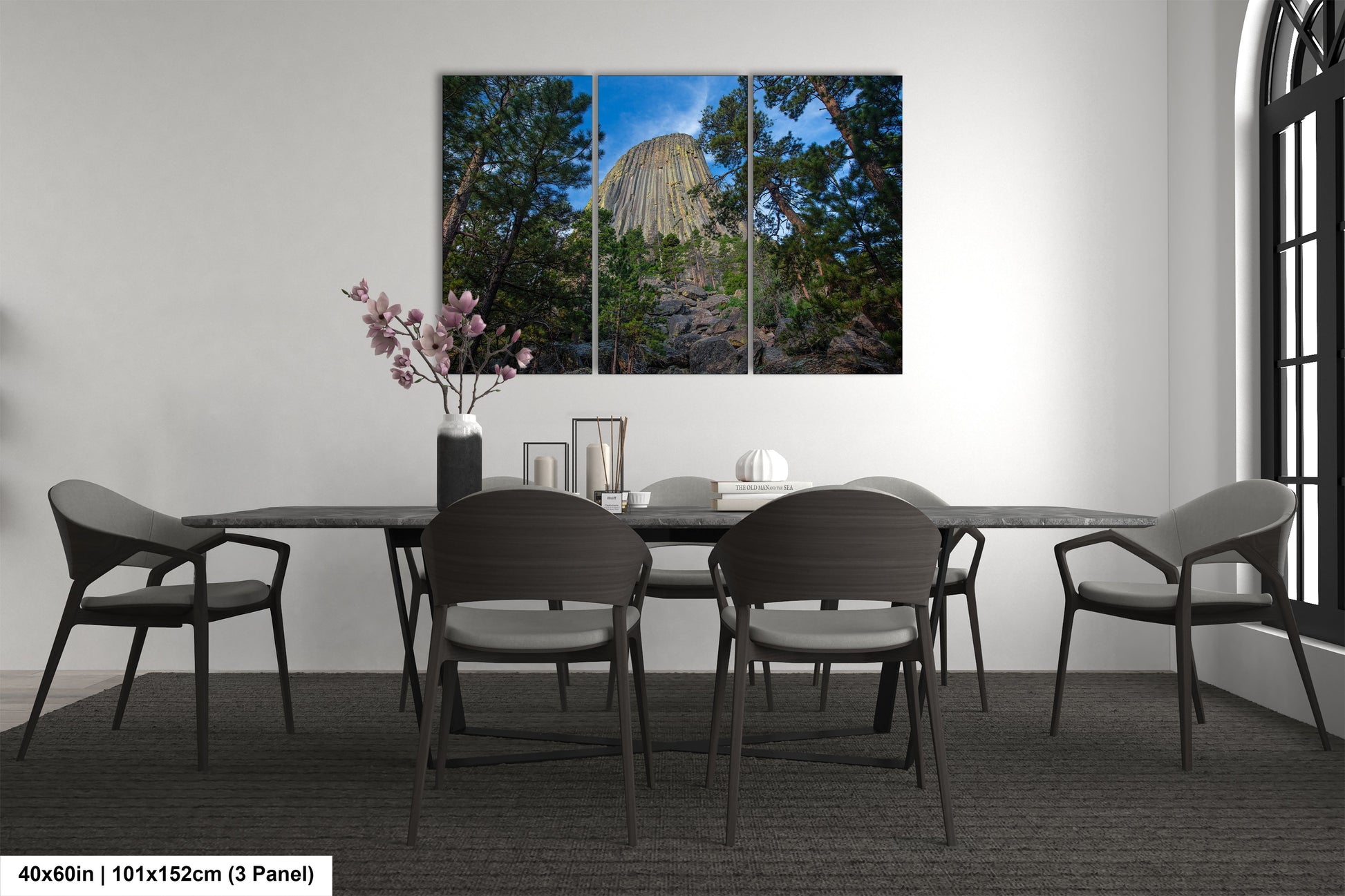 a dining room with a table and chairs