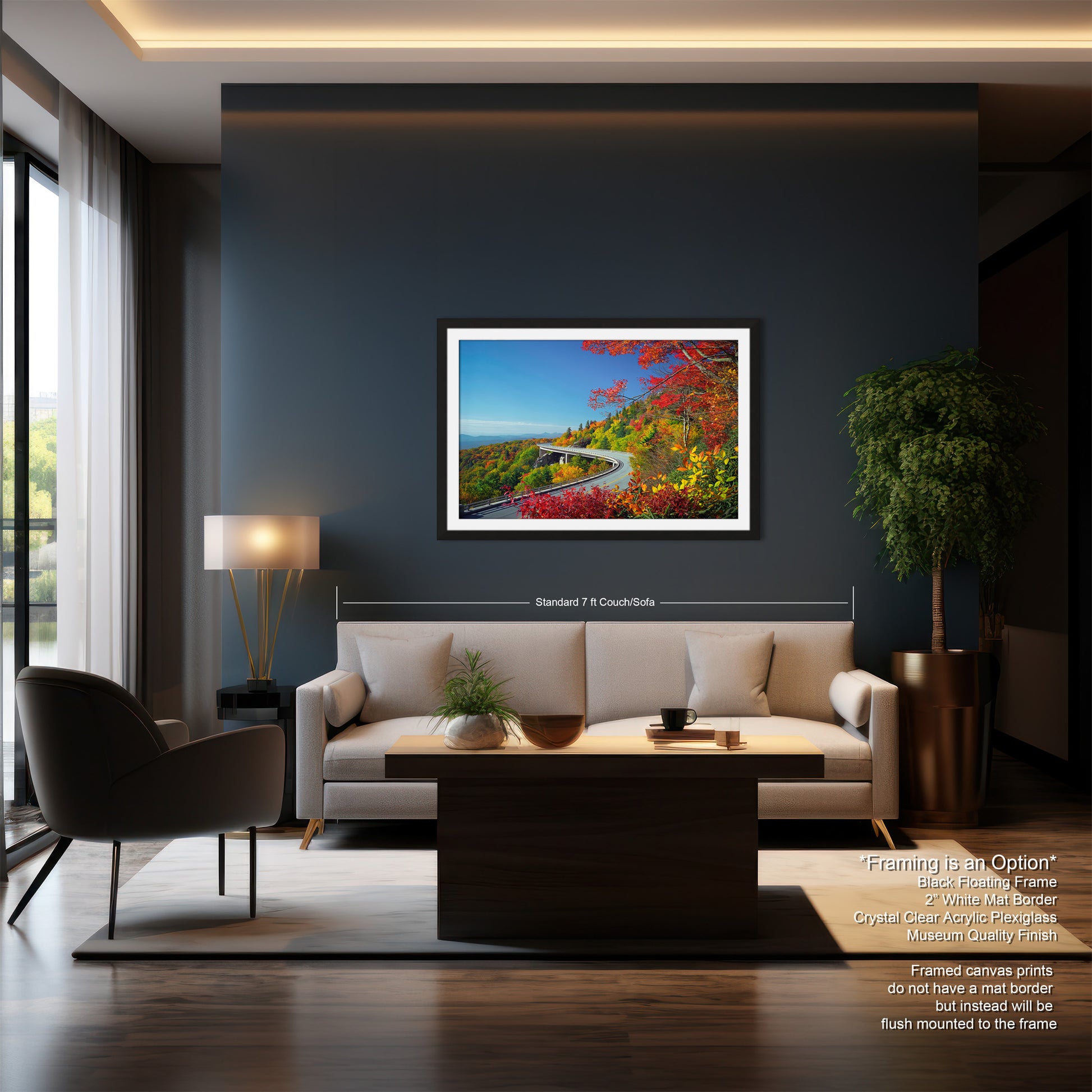 a living room with a couch a chair and a painting on the wall