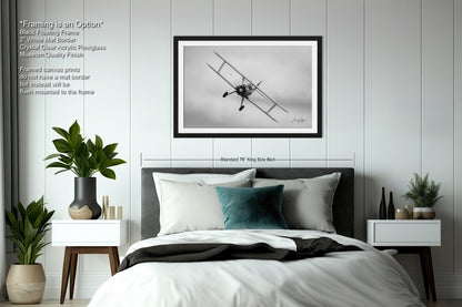 a black and white photo of a bedroom with a bed