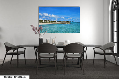a room with a table and chairs and a painting on the wall
