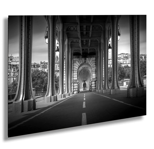 a black and white photo of a bridge