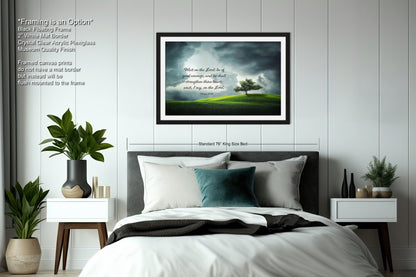 a bedroom with a bed and a picture on the wall