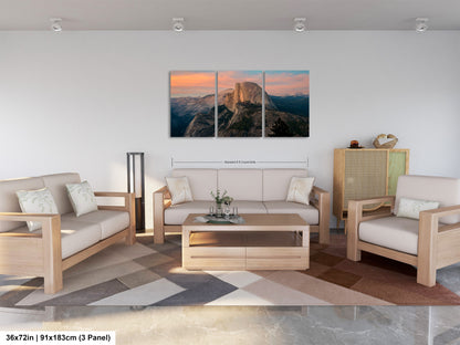 a living room filled with furniture and a painting on the wall
