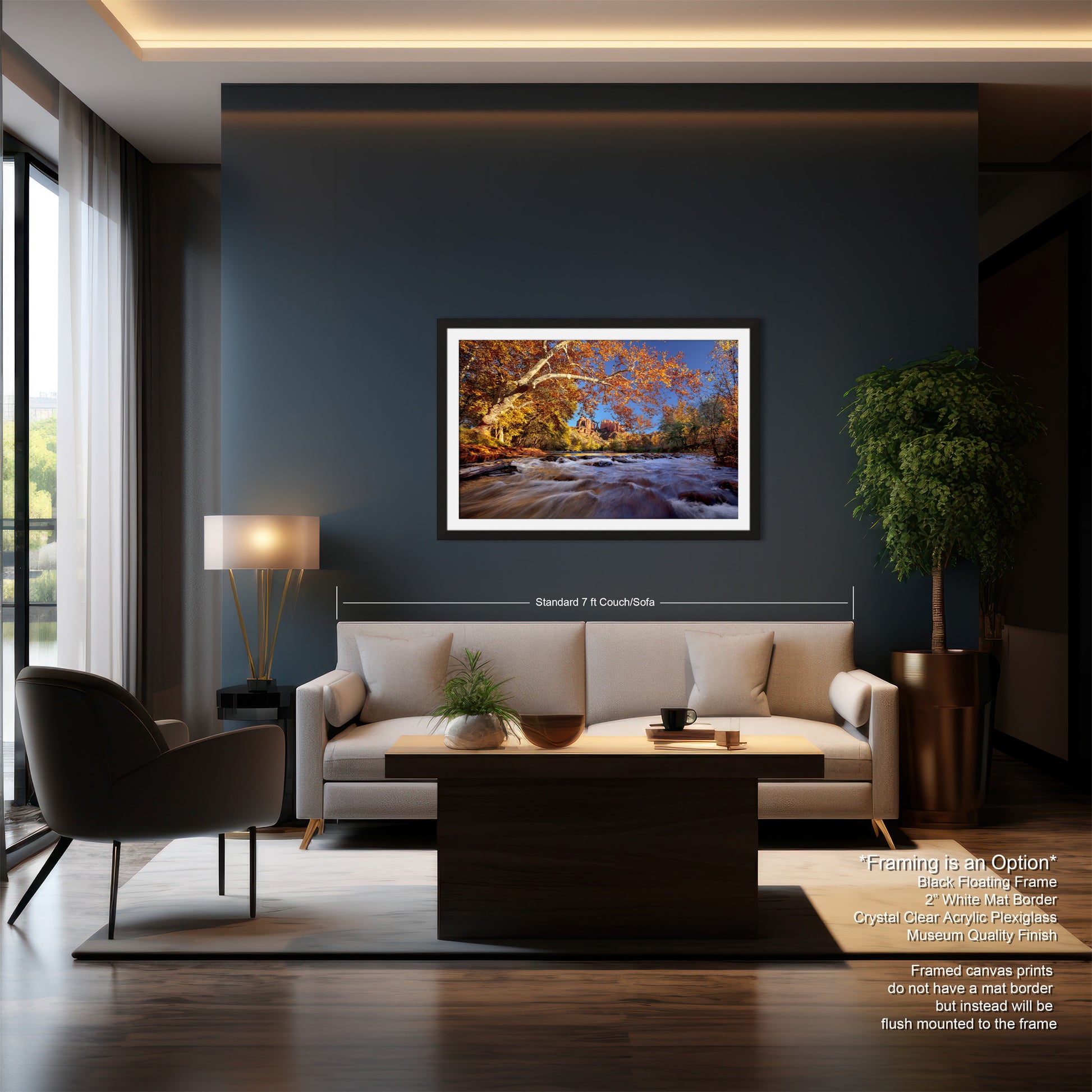 a living room with a couch a chair and a painting