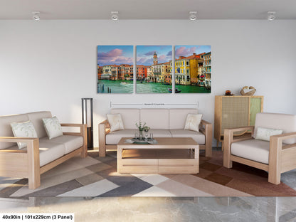 a living room filled with furniture and a painting on the wall