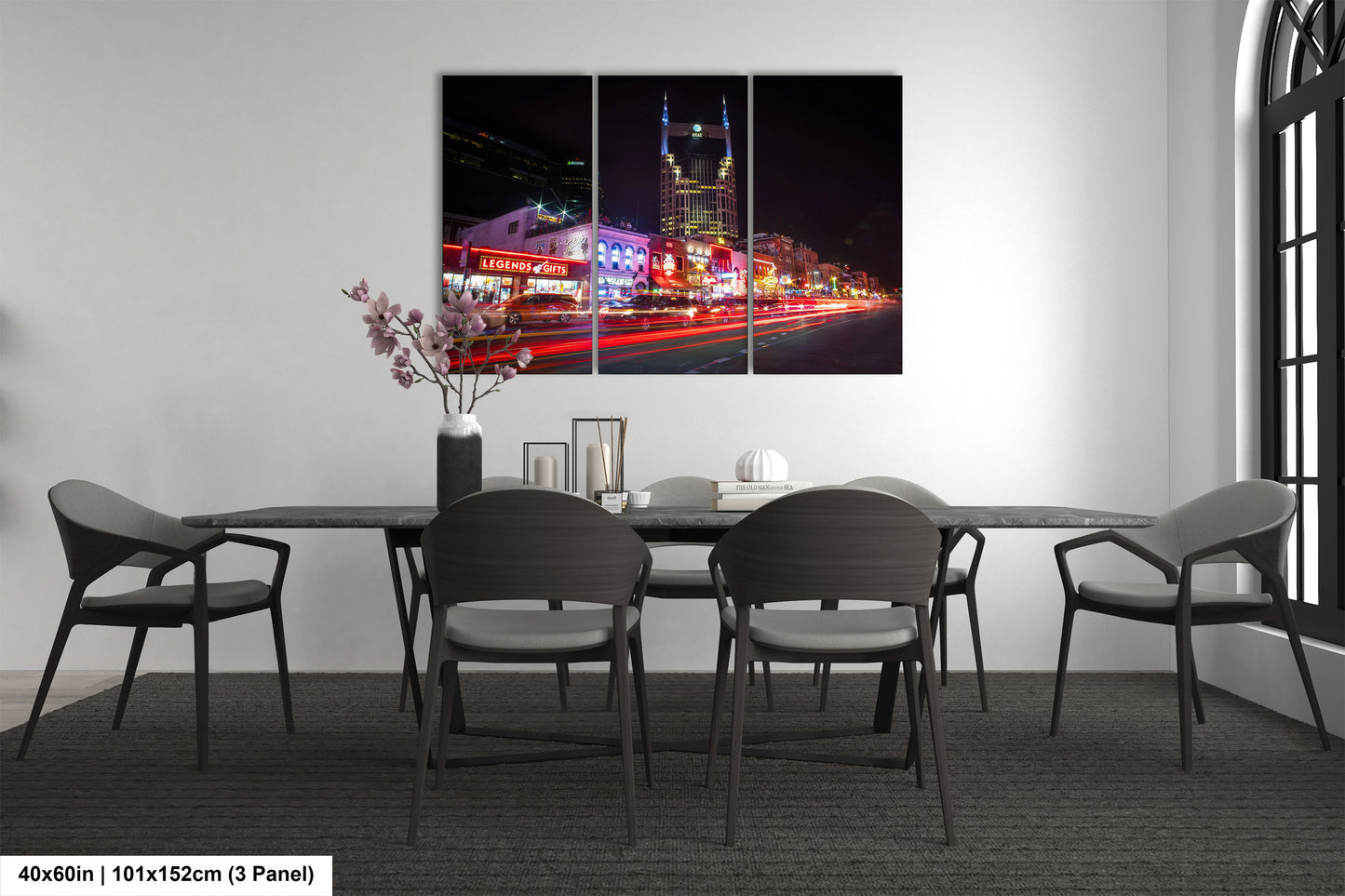 a dining room with a table and chairs