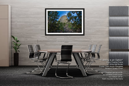a picture of a dining room with a table and chairs