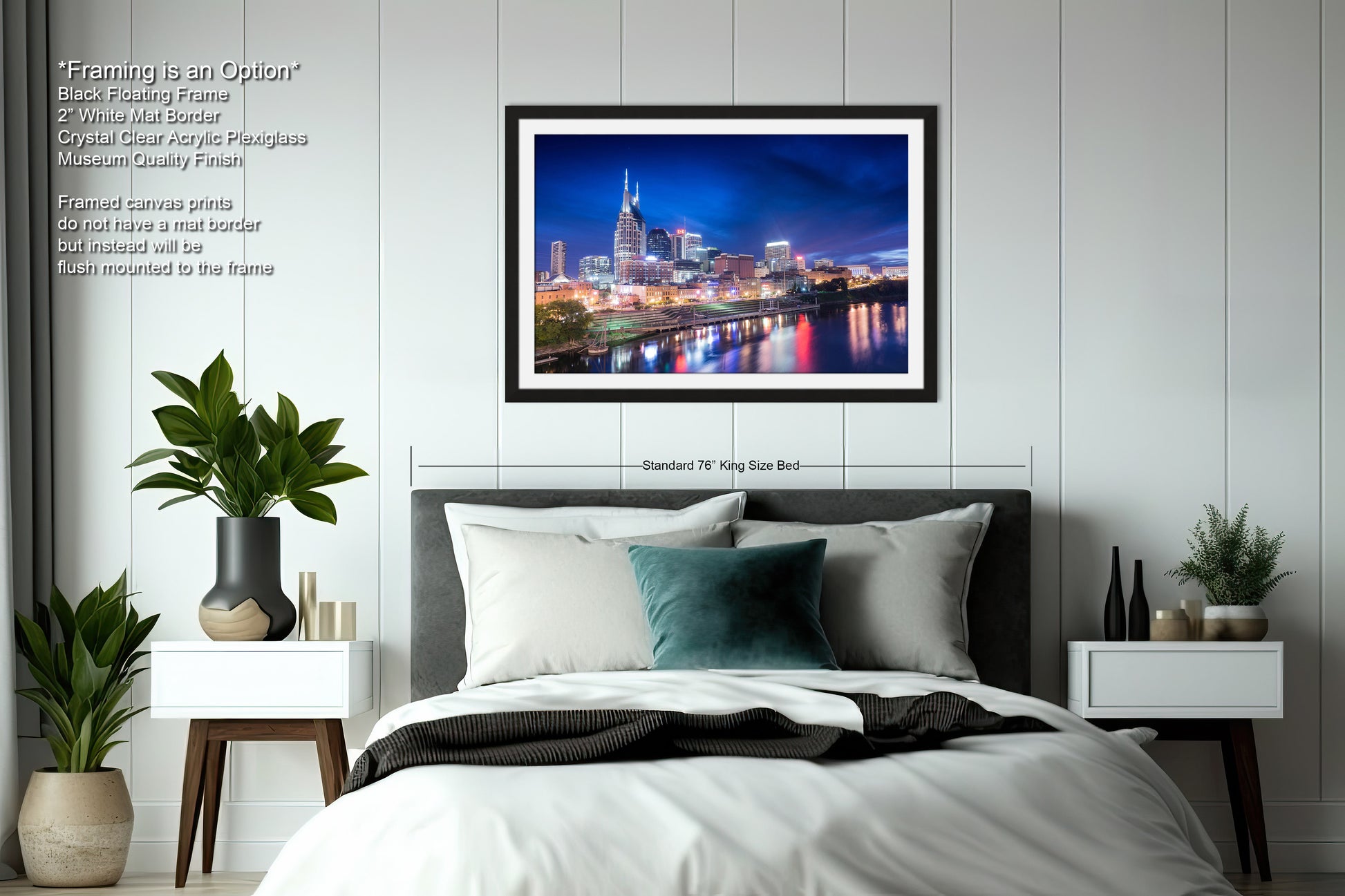 a bedroom with a picture of a city at night