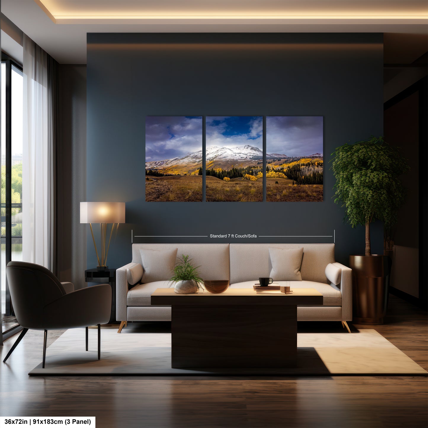 a living room filled with furniture and a painting on the wall