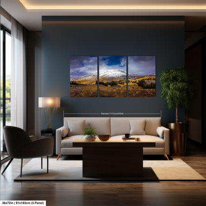 a living room filled with furniture and a painting on the wall