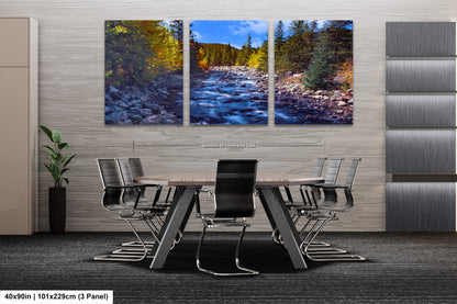 a dining room table with chairs and a painting on the wall