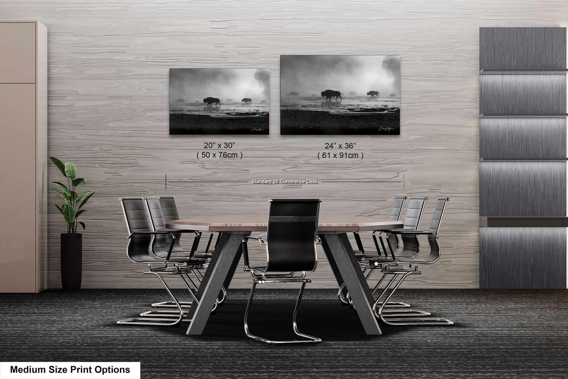 a dining room table with four chairs and two pictures on the wall